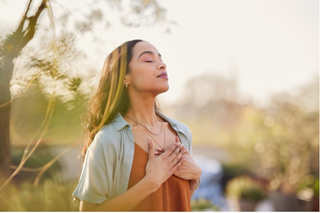 Woman practicing mindfulness in nature