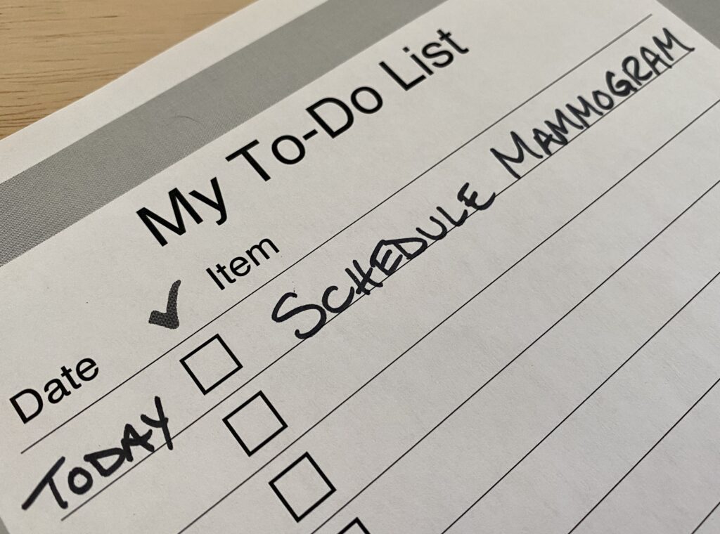A printed to-do list with checkboxes and single task - schedule mammogram