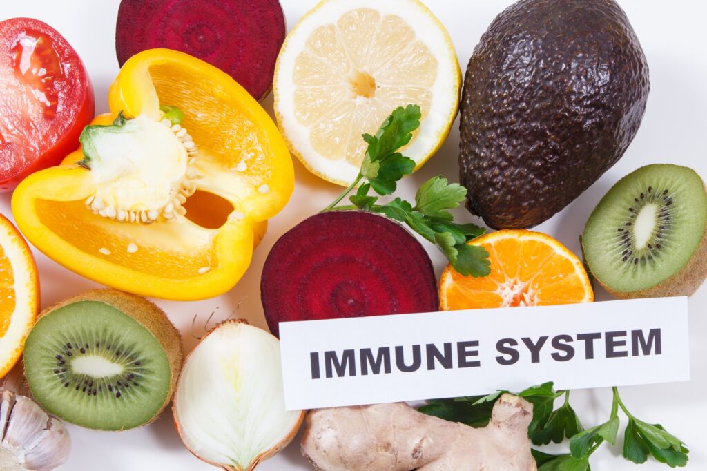 Immune system and fresh fruits with vegetables.