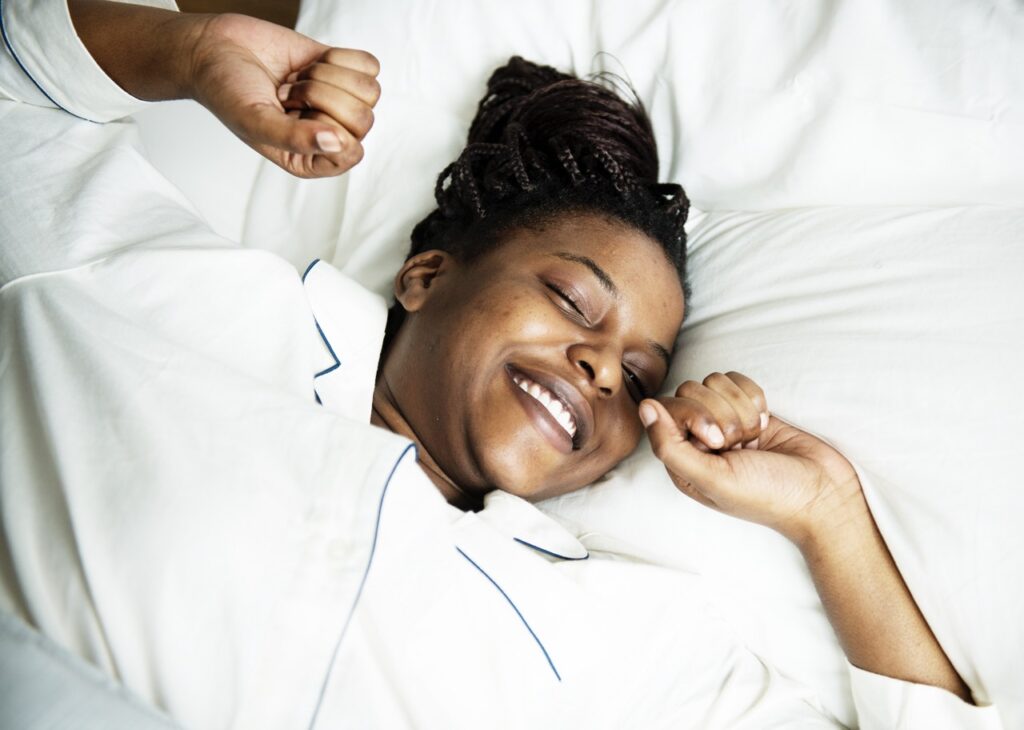 Going to bed and waking up at the same time every day helps regulate your body’s internal clock.
